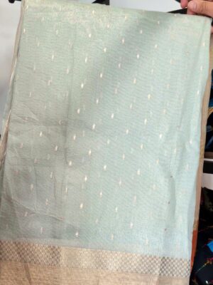 Pale aqua woven saree with tiny gold buttis and zari border