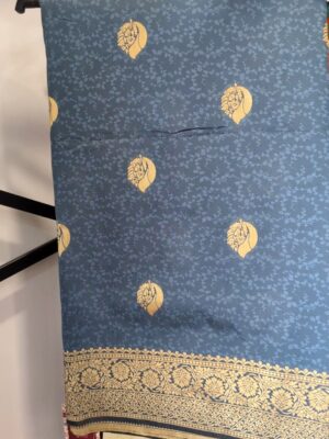 Steel blue woven saree with gold paisley buttis and zari border